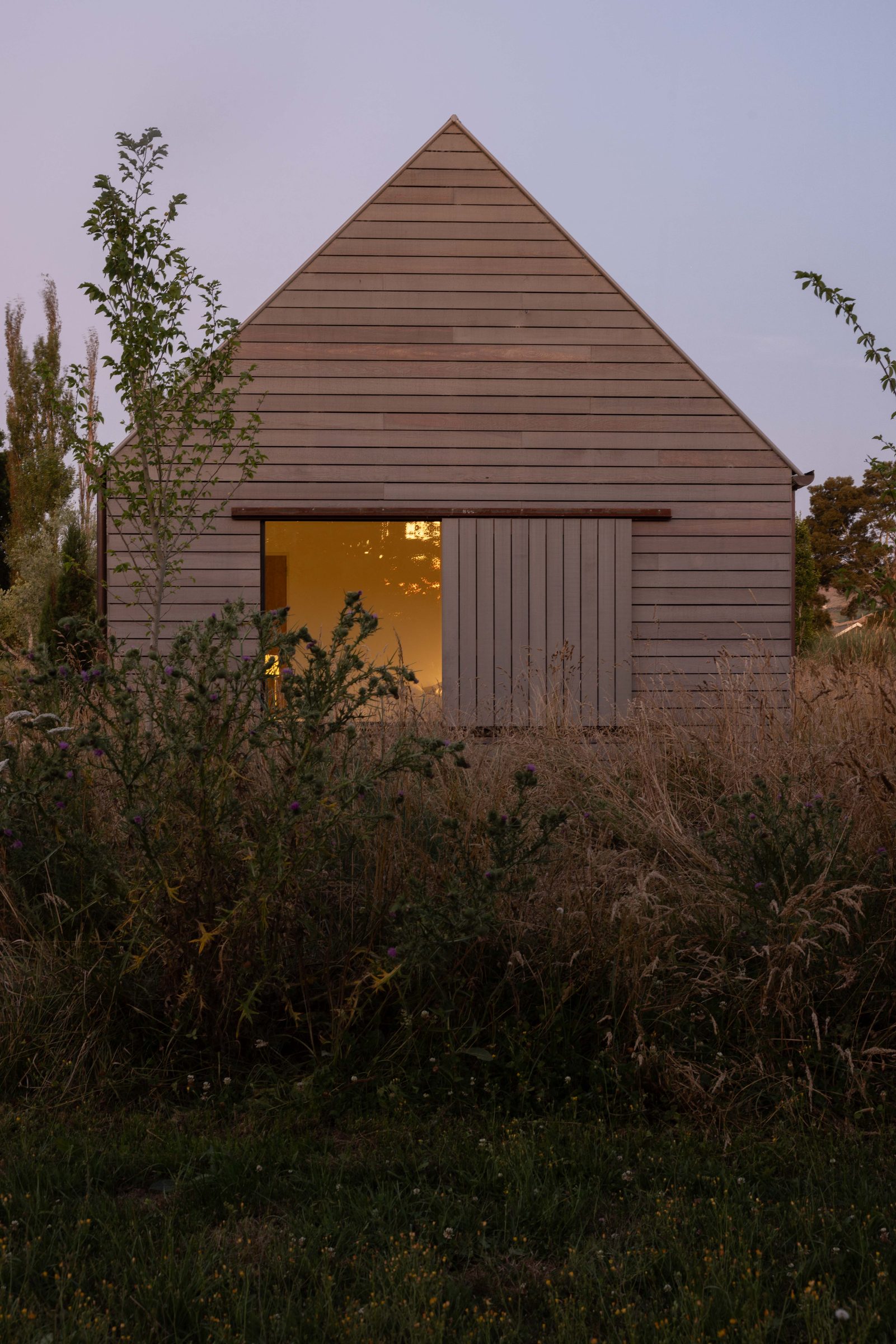 Detail — timber cladding meets steel reveal
